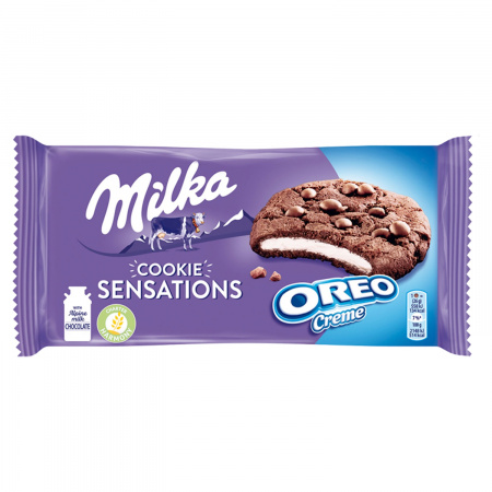 Milka Cookie Sensations Ciastka kakaowe z kawałkami czekolady i nadzieniem o smaku waniliowym 156 g